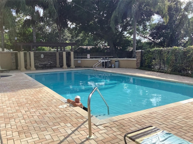 view of pool featuring a patio area