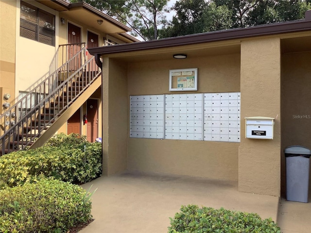 view of home's community featuring a mail area