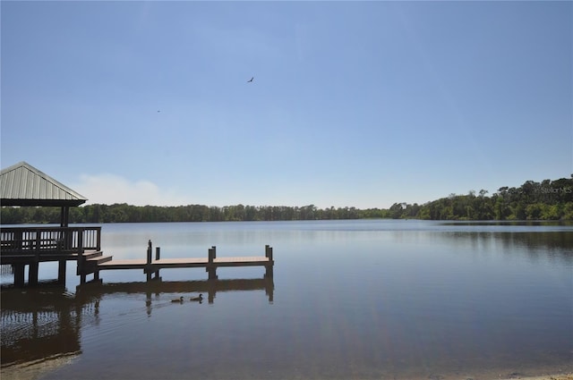 dock area featuring a gazebo and a water view