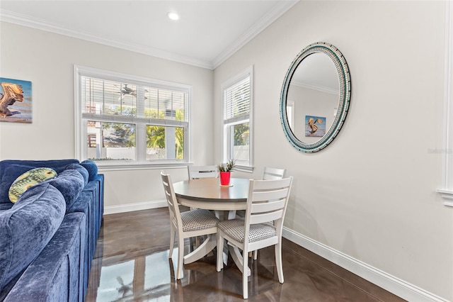 dining area with ornamental molding