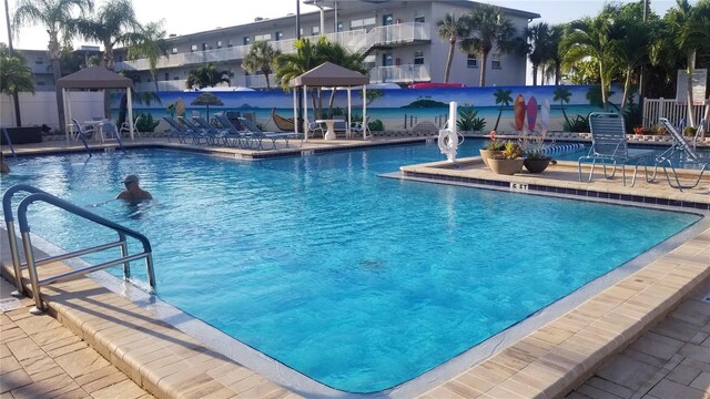 community pool featuring fence