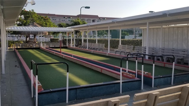 surrounding community with a bocce ball area