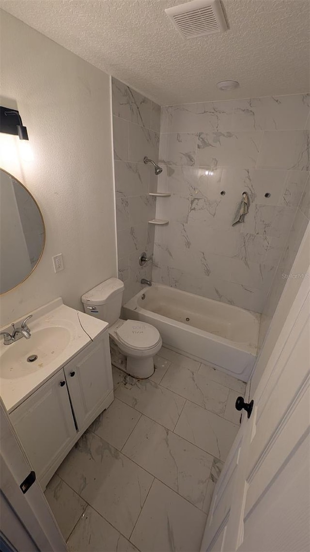 full bathroom featuring shower / bath combination, a textured ceiling, visible vents, toilet, and marble finish floor