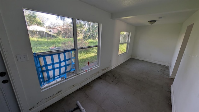 interior space with baseboards