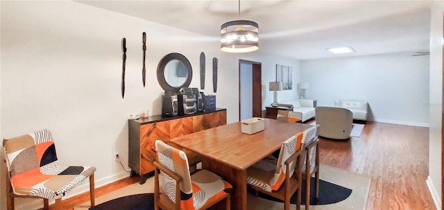 dining area featuring hardwood / wood-style flooring