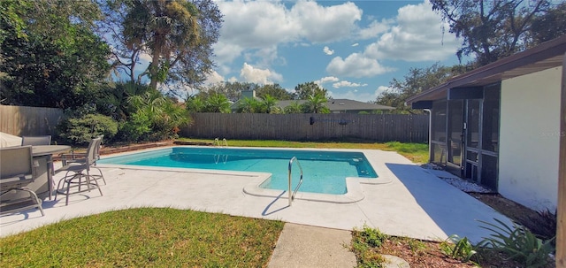 view of swimming pool featuring a patio