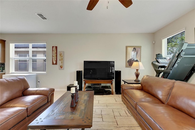 living room featuring ceiling fan