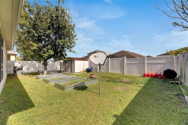 view of yard with a storage unit