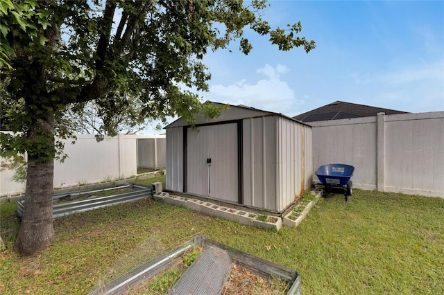 view of outdoor structure featuring a lawn