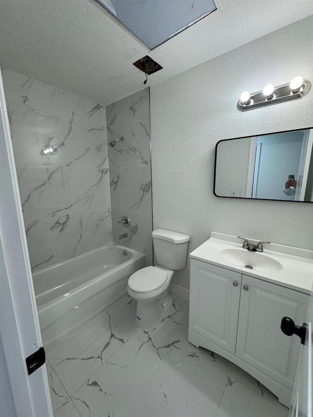 full bathroom featuring tiled shower / bath combo, toilet, a textured ceiling, and vanity