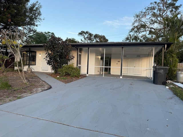 view of front facade with a carport