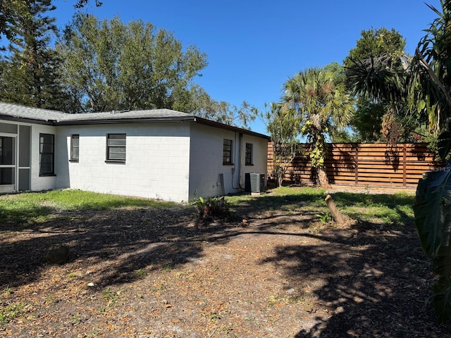 view of property exterior featuring central AC