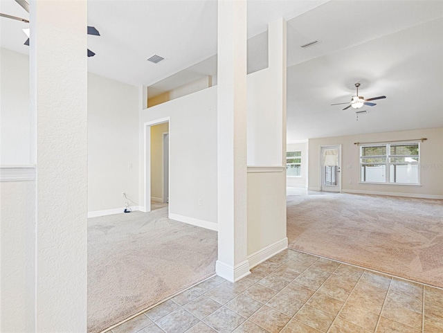 spare room with light colored carpet