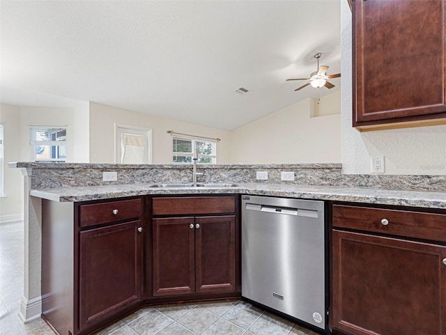 kitchen featuring vaulted ceiling, kitchen peninsula, sink, stainless steel dishwasher, and ceiling fan