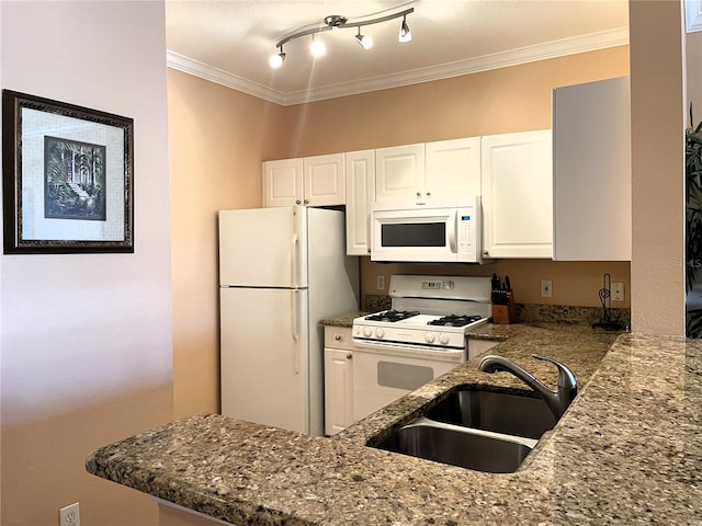 kitchen featuring ornamental molding, white cabinetry, sink, and white appliances