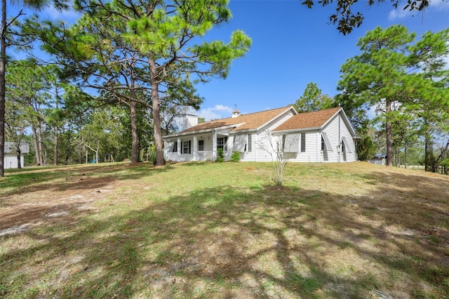 exterior space with a lawn