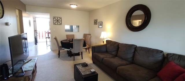 living room featuring light carpet