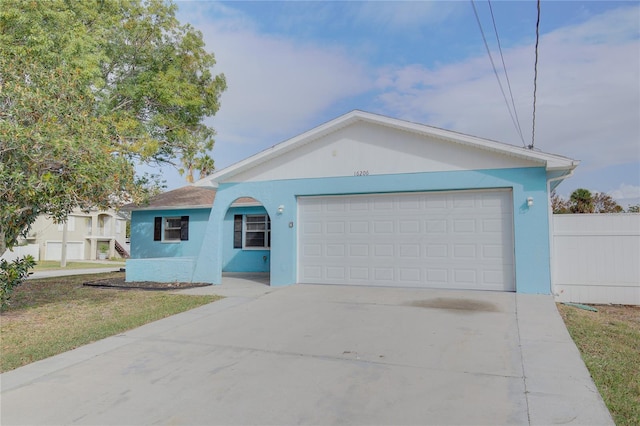 single story home with a garage