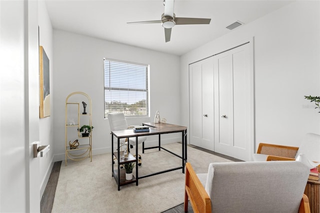 office featuring ceiling fan and light hardwood / wood-style floors