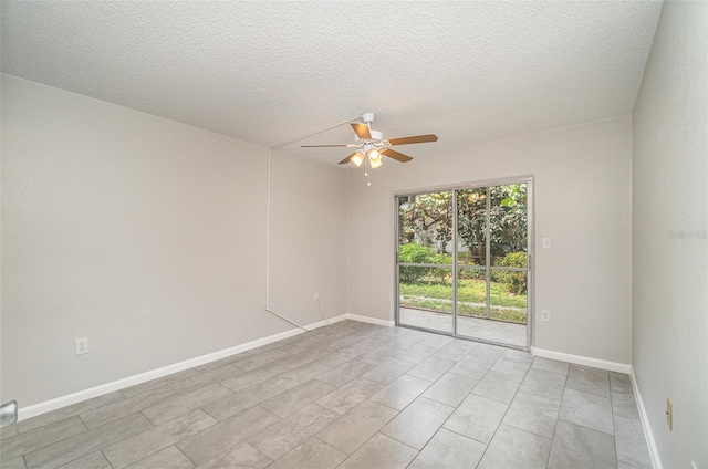 unfurnished room featuring a textured ceiling and ceiling fan