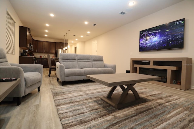 living room with light wood-type flooring