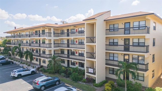315 30th Ave W Unit B201, Bradenton, FL 34205 - view of apartment building / complex featuring uncovered parking