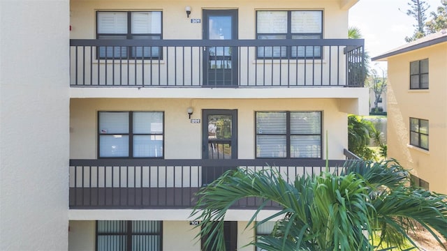 315 30th Ave W Unit B201, Bradenton, FL 34205 - view of front of property featuring a balcony and stucco siding