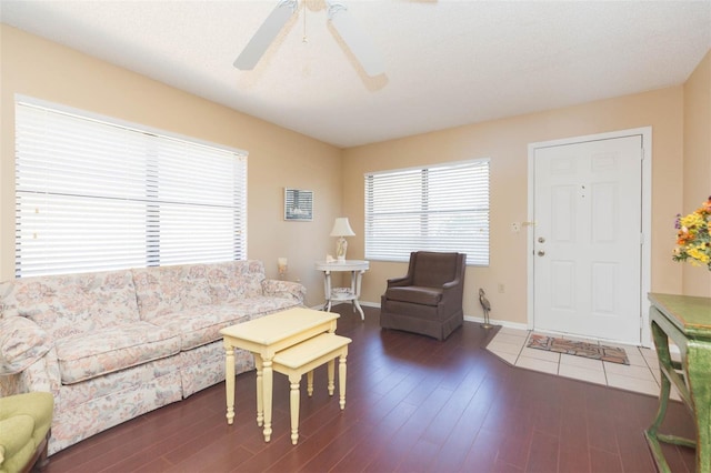 315 30th Ave W Unit B201, Bradenton, FL 34205 - living area featuring a ceiling fan, wood finished floors, and baseboards