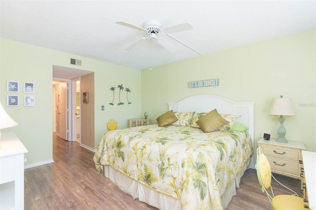 315 30th Ave W Unit B201, Bradenton, FL 34205 - bedroom with wood finished floors, baseboards, and ceiling fan