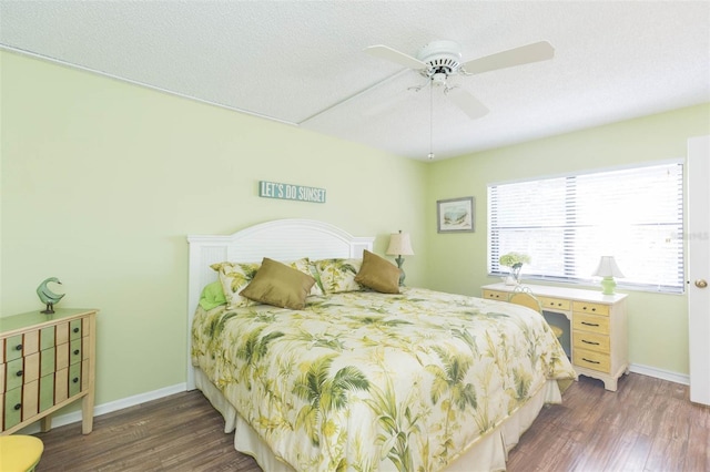 315 30th Ave W Unit B201, Bradenton, FL 34205 - bedroom featuring wood finished floors, baseboards, and a ceiling fan