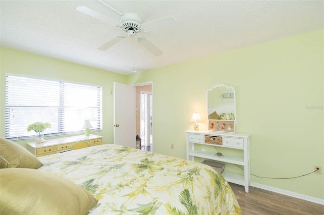 315 30th Ave W Unit B201, Bradenton, FL 34205 - bedroom with wood finished floors, baseboards, and a ceiling fan