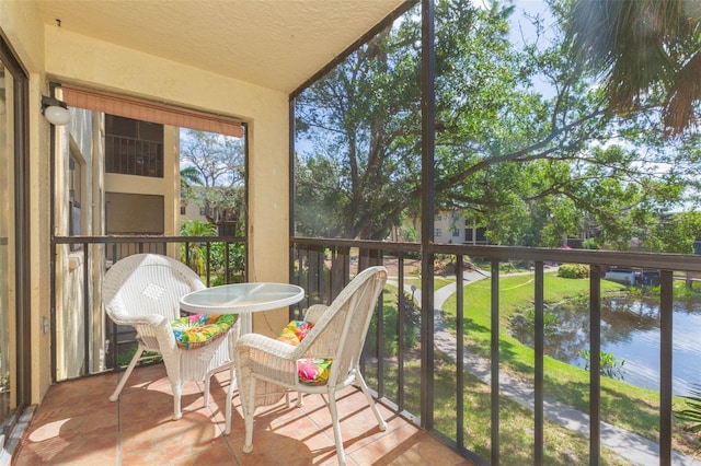315 30th Ave W Unit B201, Bradenton, FL 34205 - sunroom featuring outdoor dining space