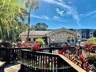 315 30th Ave W Unit B201, Bradenton, FL 34205 - view of wooden balcony with a deck