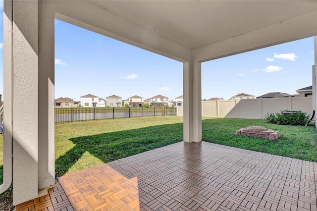 view of patio with a water view