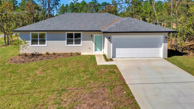 ranch-style house with a garage and a front lawn