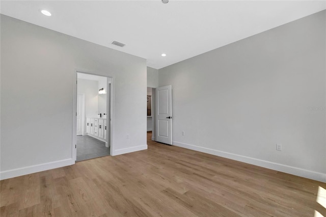 unfurnished bedroom with light hardwood / wood-style flooring