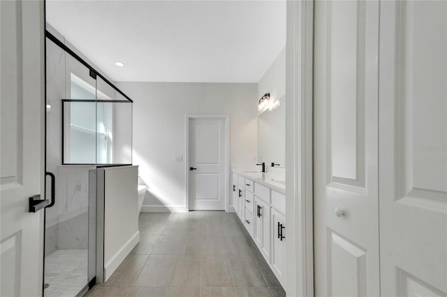 bathroom featuring vanity, separate shower and tub, and tile patterned flooring