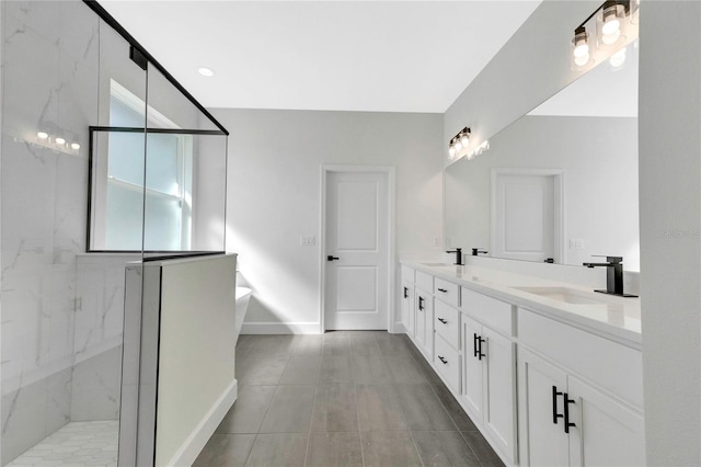 bathroom with vanity, plus walk in shower, and tile patterned flooring