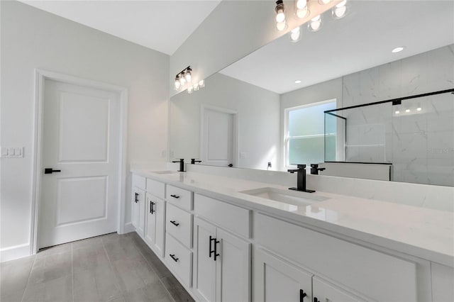 bathroom with vanity and walk in shower