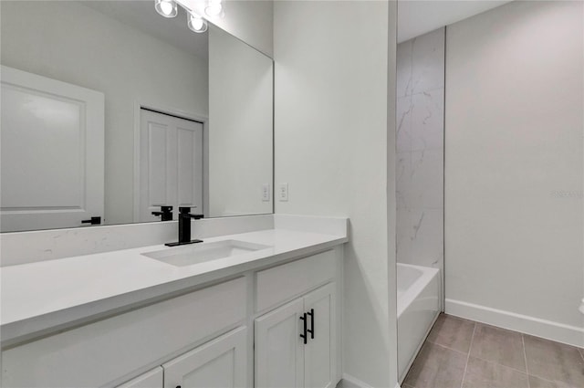 bathroom with vanity and tile patterned floors