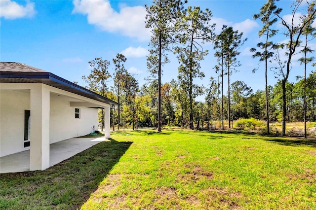 view of yard featuring a patio