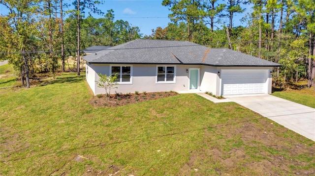 ranch-style house with a garage and a front lawn