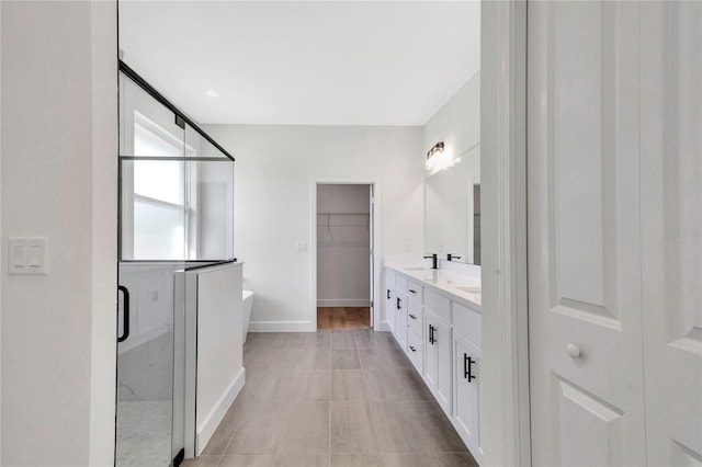 bathroom featuring vanity and shower with separate bathtub