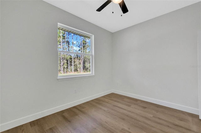 unfurnished room with light hardwood / wood-style floors and ceiling fan