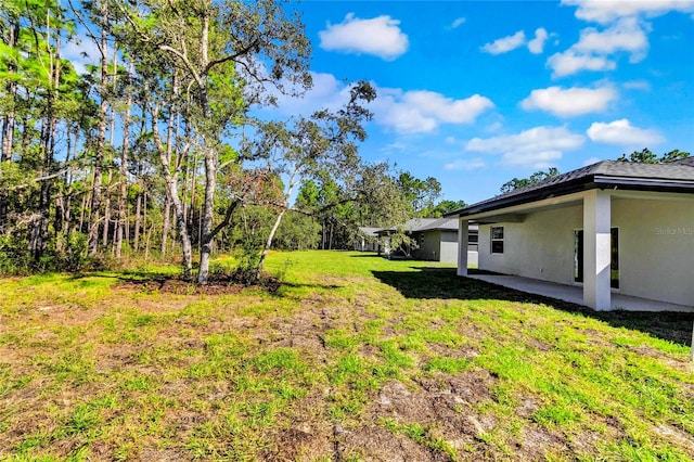 view of yard with a patio area