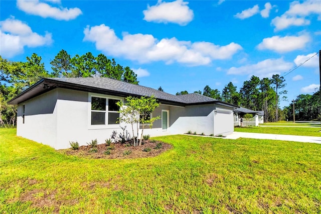 ranch-style home with a front lawn