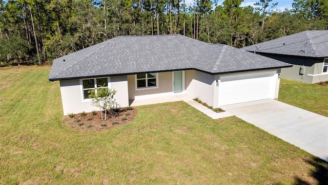 ranch-style home with a front yard and a garage