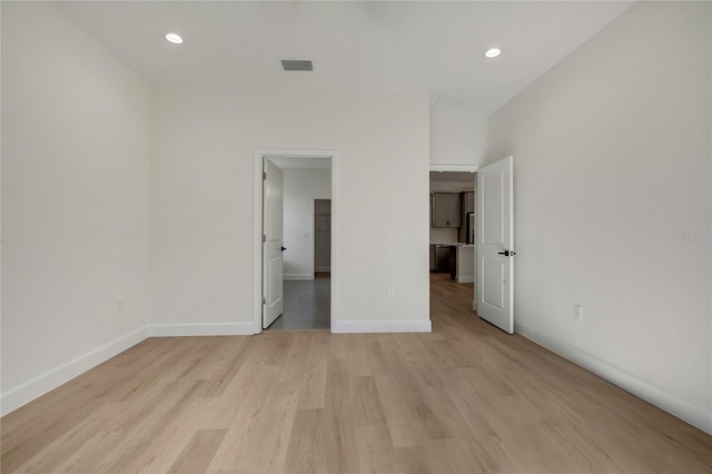 unfurnished bedroom with light hardwood / wood-style floors