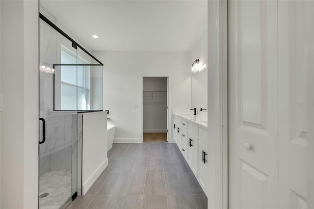 bathroom with vanity, separate shower and tub, and tile patterned flooring