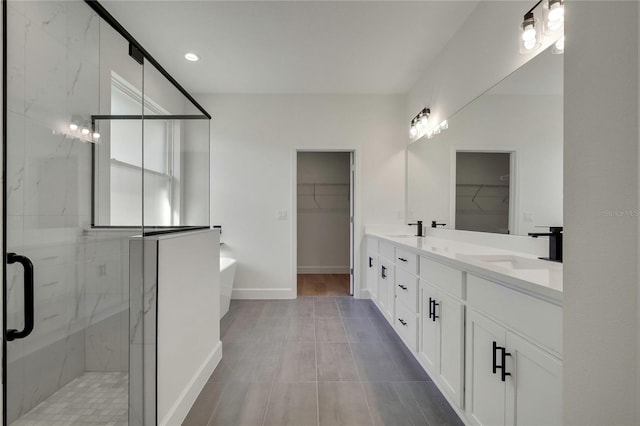 bathroom featuring vanity and plus walk in shower